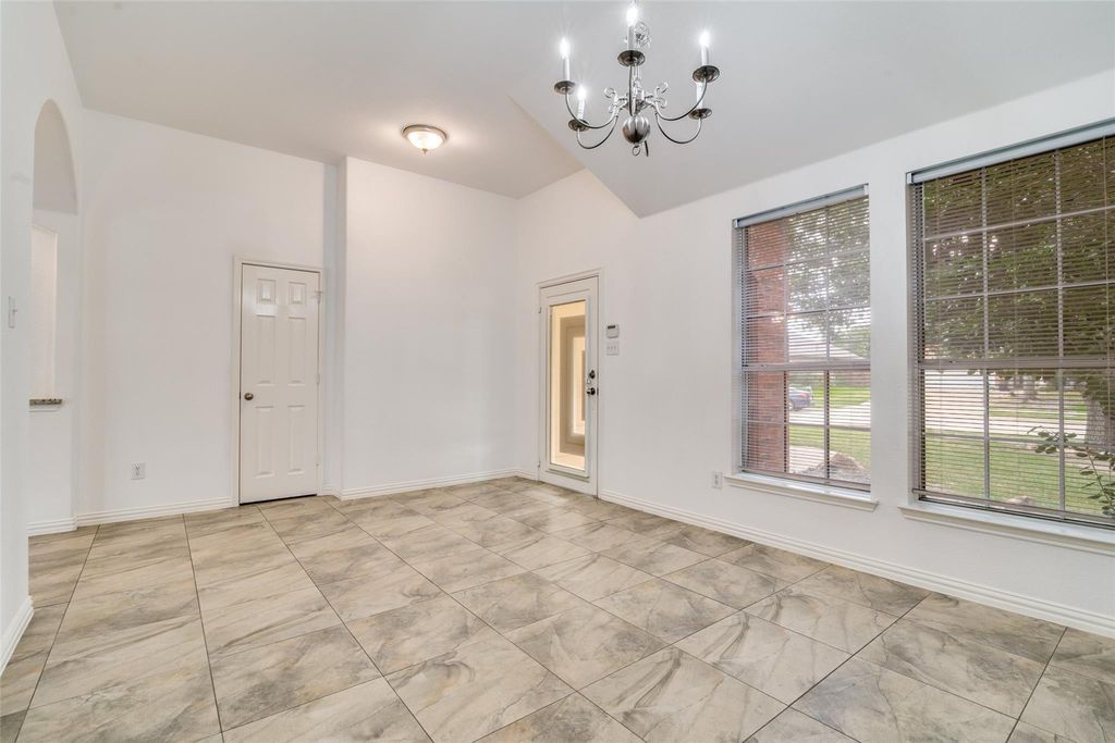 Dining area with a chandelier