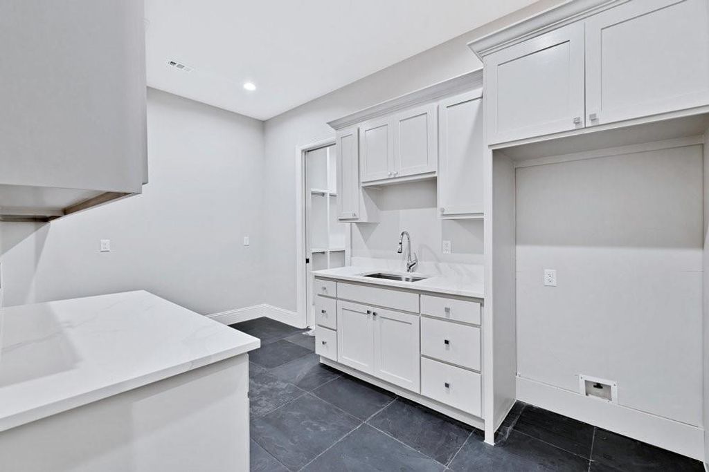 Laundry Room w/ Sink and room for a 2nd Refrigerator