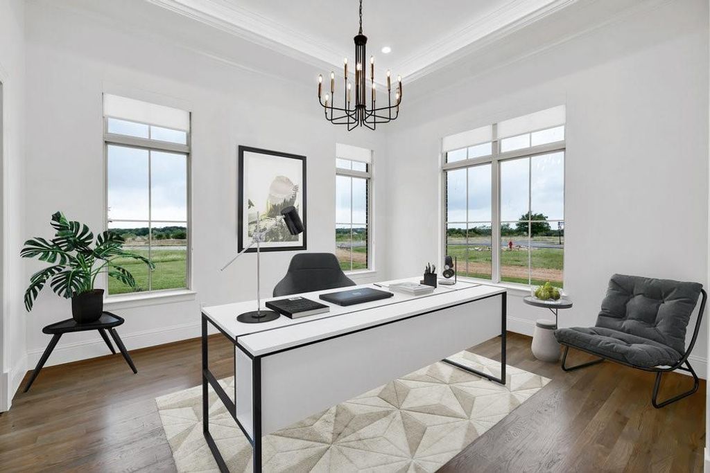 Virtually staged dining room as a 2nd office.
