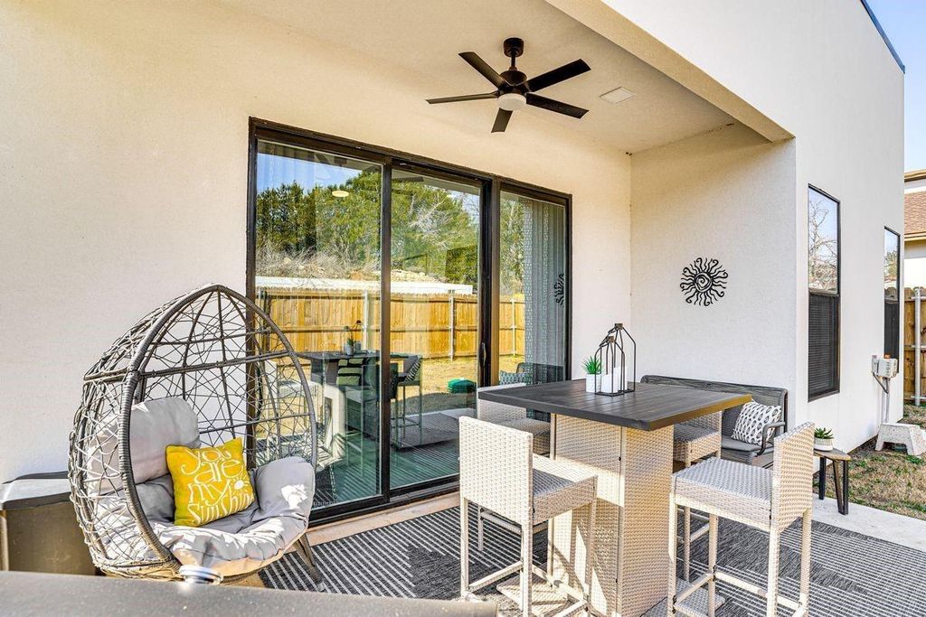 View of patio / terrace featuring outdoor dining area and a ceiling fan