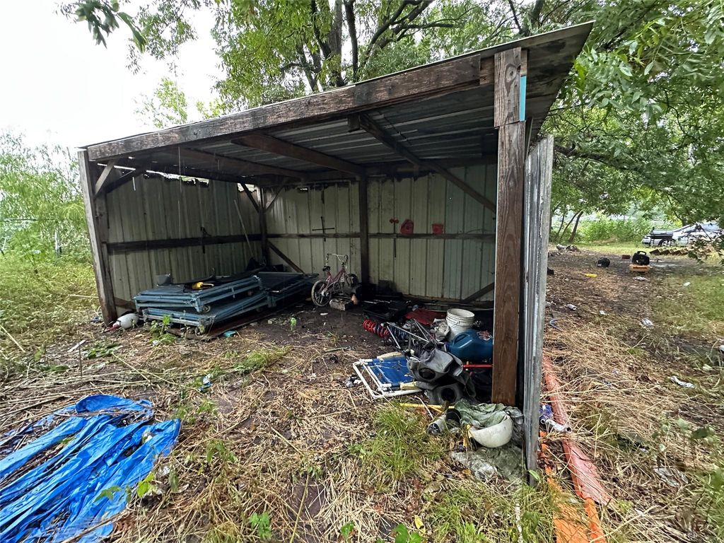 View of pole building featuring a detached carport
