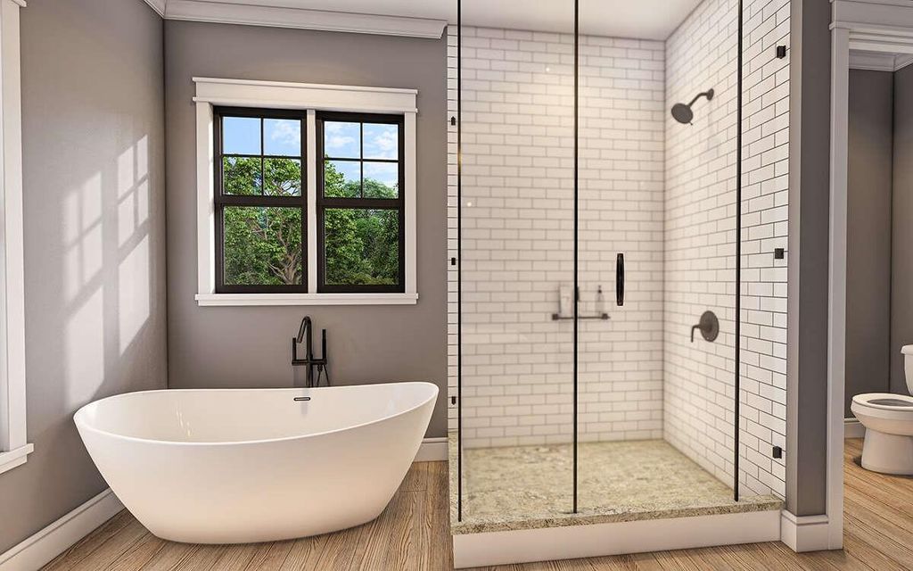 Bathroom with a stall shower, a soaking tub, and wood finished floors