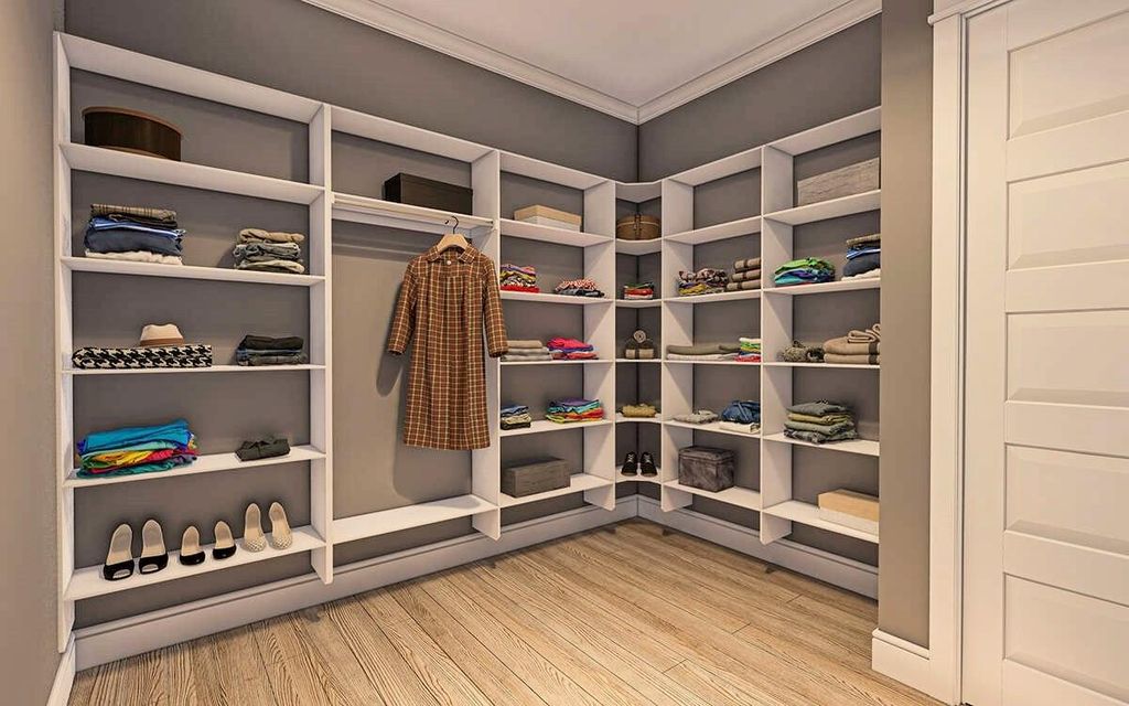 Spacious closet with light wood finished floors