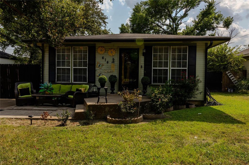 View of front of home with a patio and outdoor lounge area