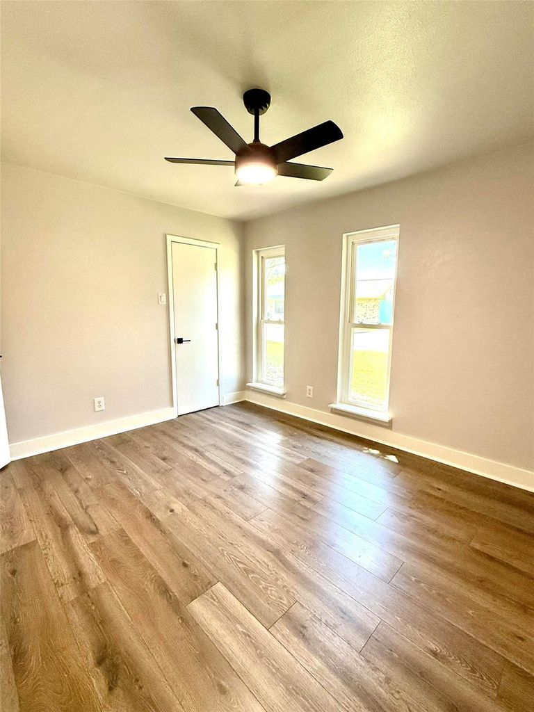 Spare room featuring light wood finished floors