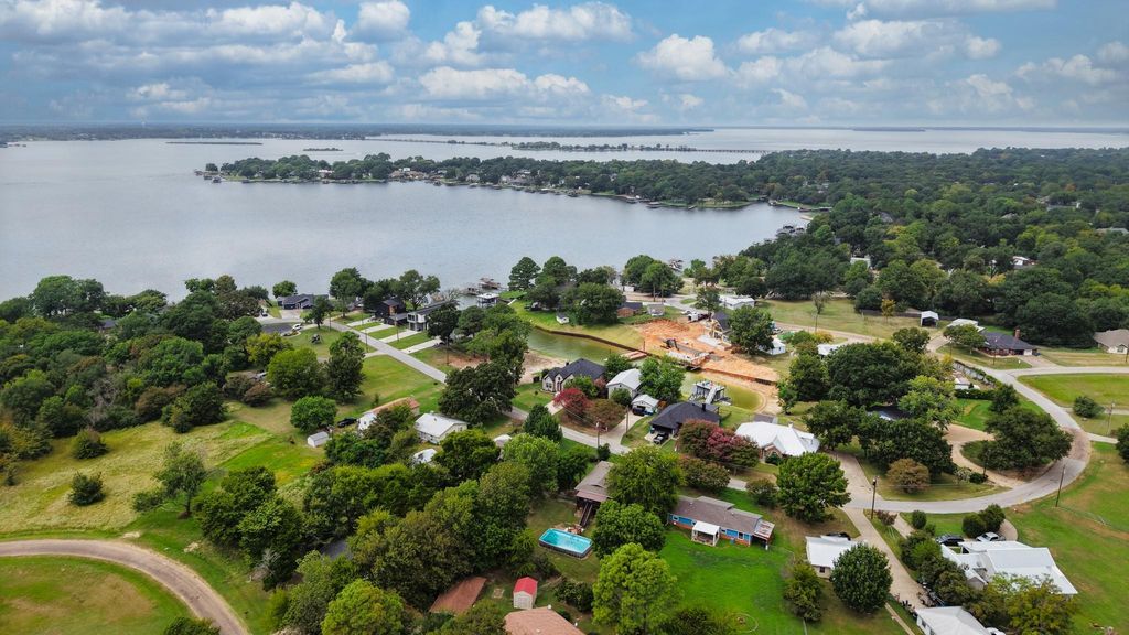 Aerial view of residential area with a nearby body of water