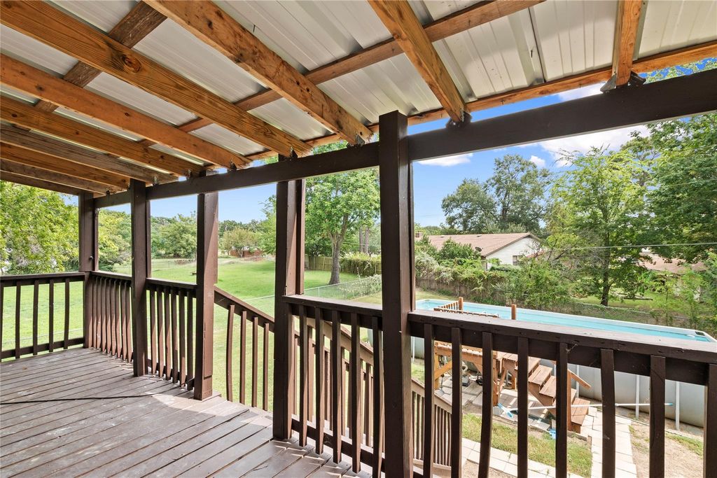 Deck featuring an outdoor pool