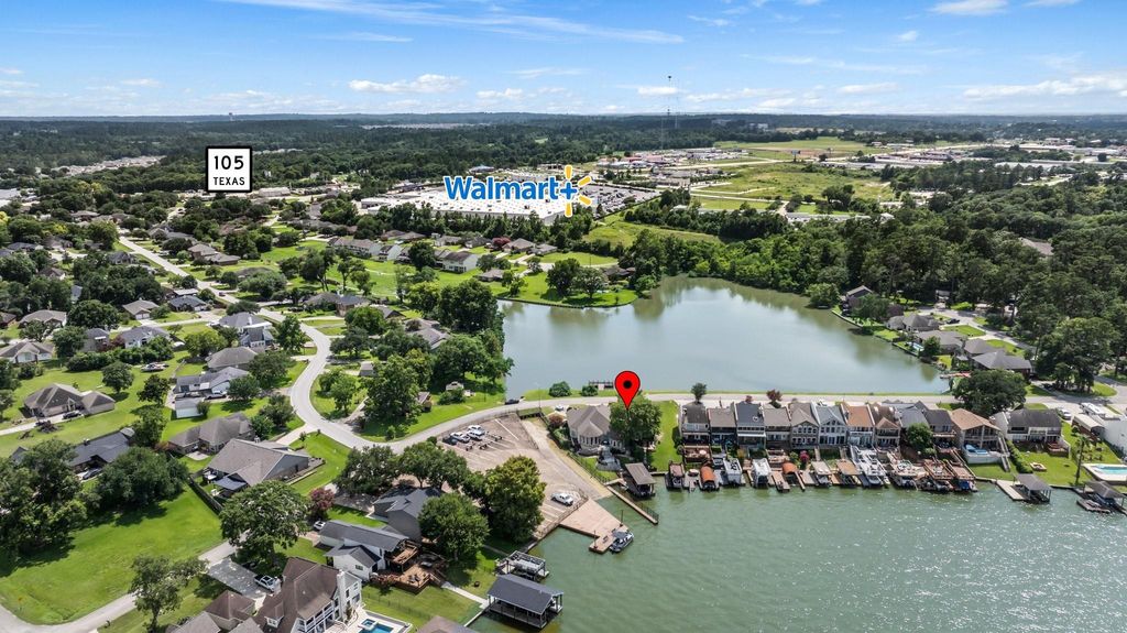 GREAT LOCATION! SITS ON LAKE CONROE ON ONE SIDE AND STANLEY LAKE ON THE OTHER. 