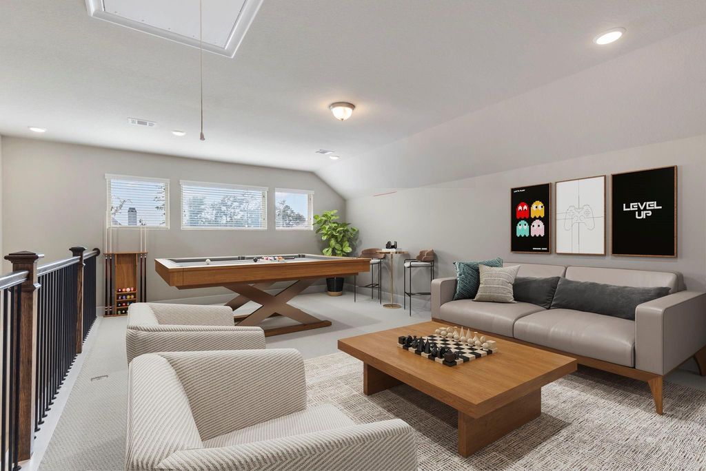 Upstairs is the gameroom! Virtually staged