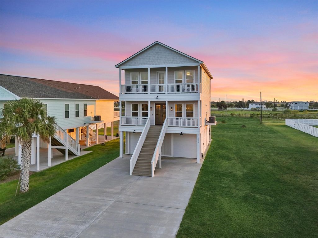 Property includes the side lot and sits on nearly half an acre