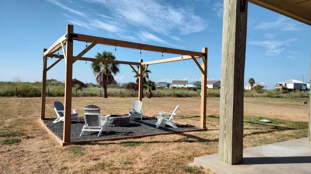 Backyard recently added Fire Pit and Electricity for Outdoor Lighting
