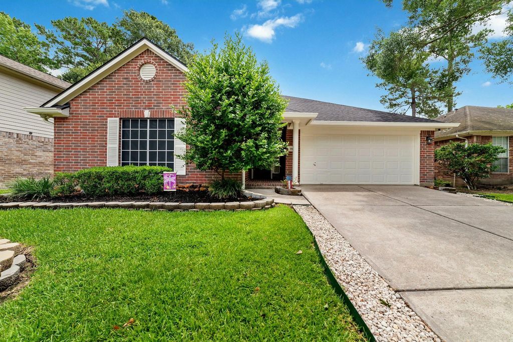The property features a warm and inviting atmosphere, complemented by meticulously maintained landscaping, vibrant flower beds, and mature trees that offer both shade and an enhanced aesthetic appeal. This ambiance extends throughout the subdivision, contributing to a pleasant and welcoming environment for all residents.