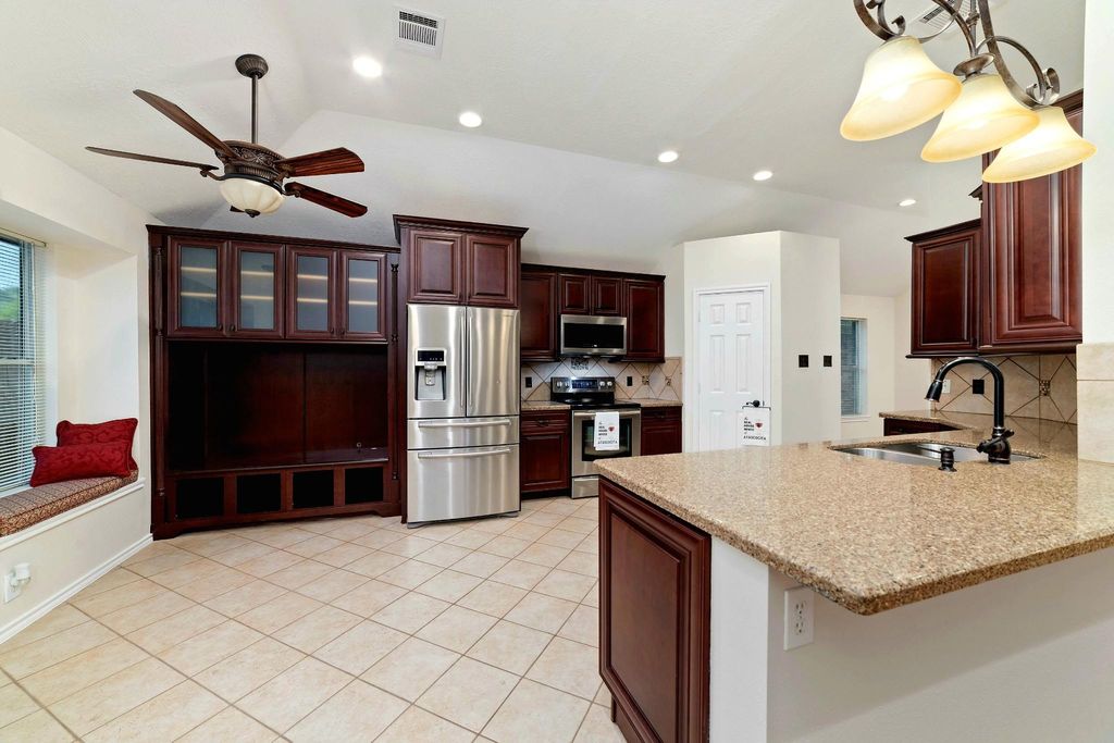  Upgraded kitchen cabinetry showcases meticulous craftsmanship and elevated design—where every detail serves both beauty and function.