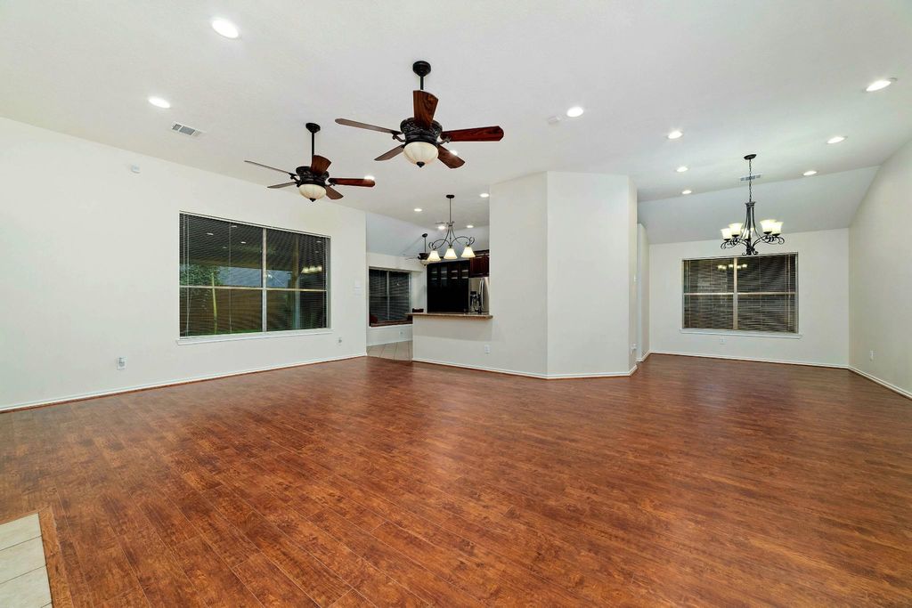 From the family room, one can fully appreciate the open-concept design that extends seamlessly throughout the living areas of the home.