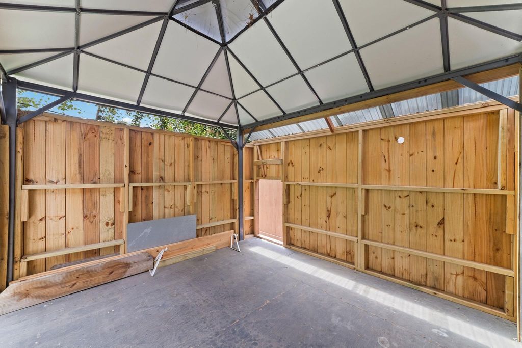 A versatile enclosed sitting area designed as an adaptable outdoor flex space, offering comfort and functionality for relaxation, socializing, or various outdoor activities