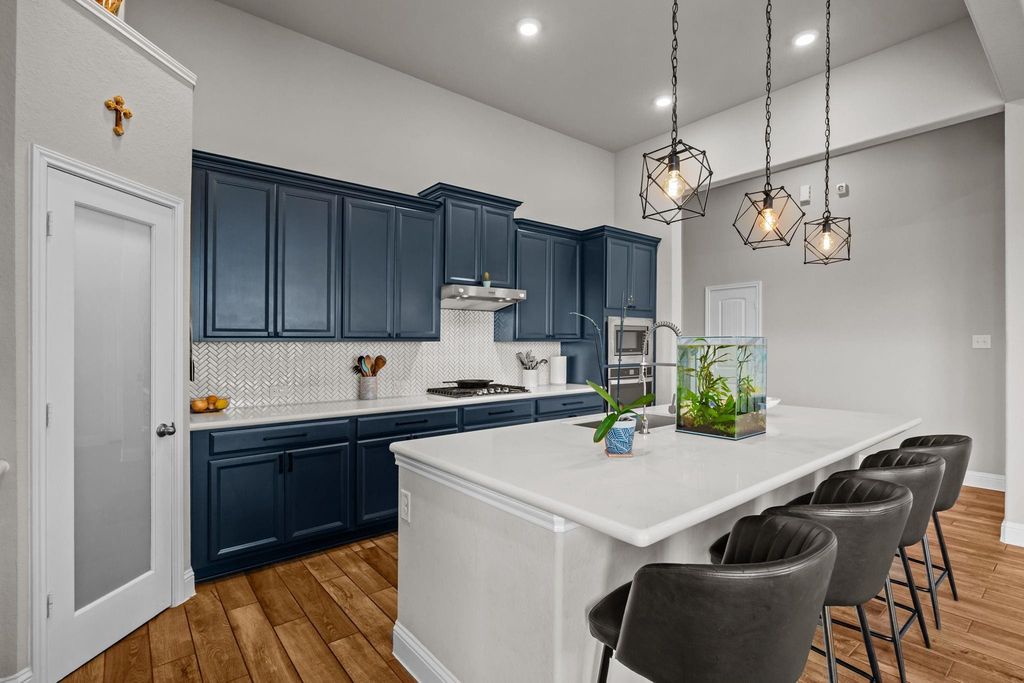 Sleek quartz countertops with rounded bullnose edges