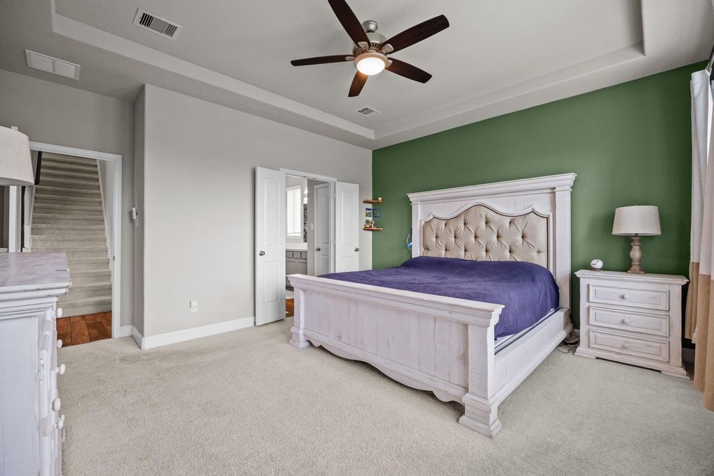Sophisticated tray ceiling adds depth and style