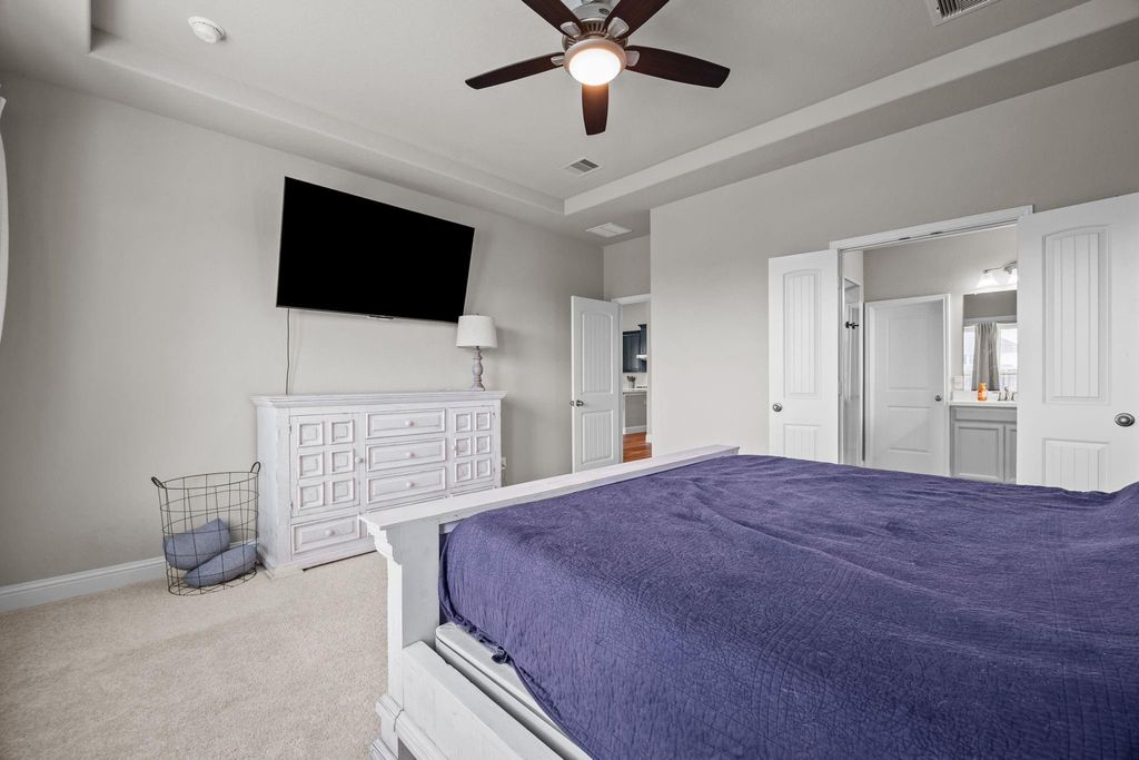Primary bedroom tucked away on the first floor