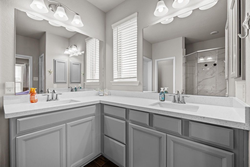 Dual vanities with abundant counter space and storage