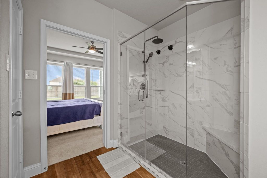 Primary bath retreat with spa-style shower