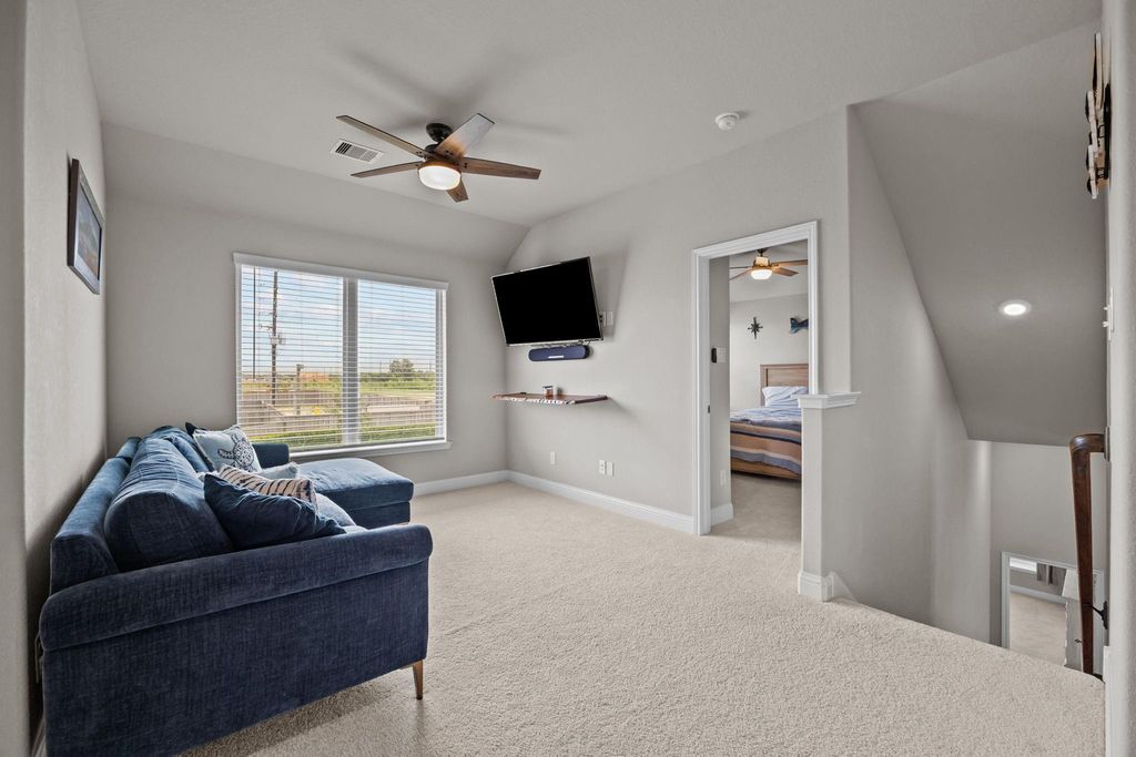 Versatile upstairs retreat for lounging, gaming, or play