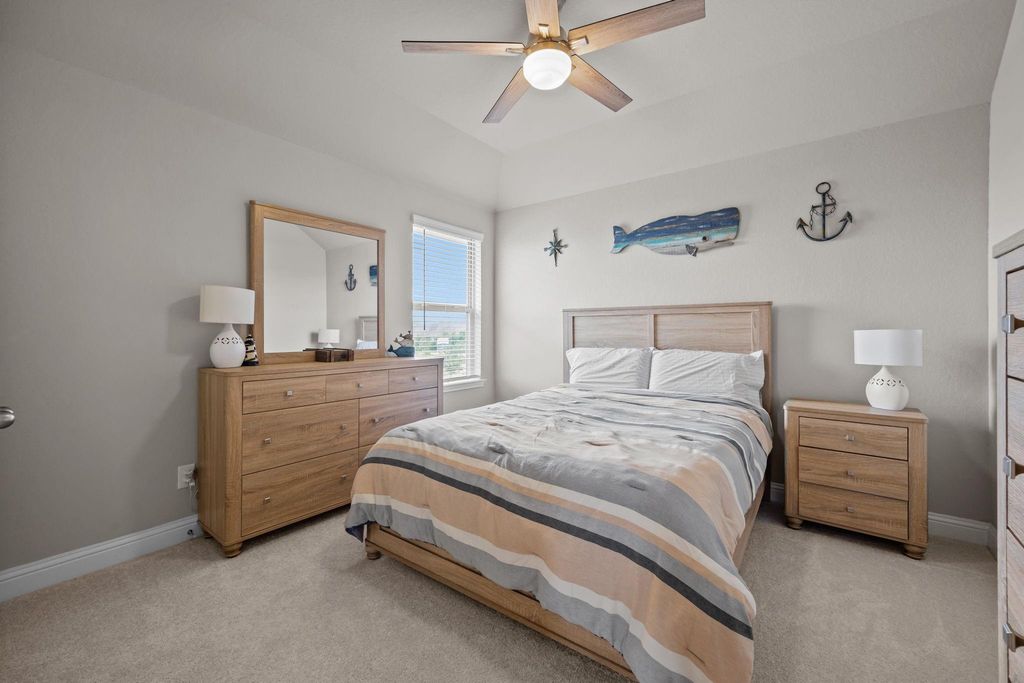 Second-floor bedroom offering comfort and flexibility