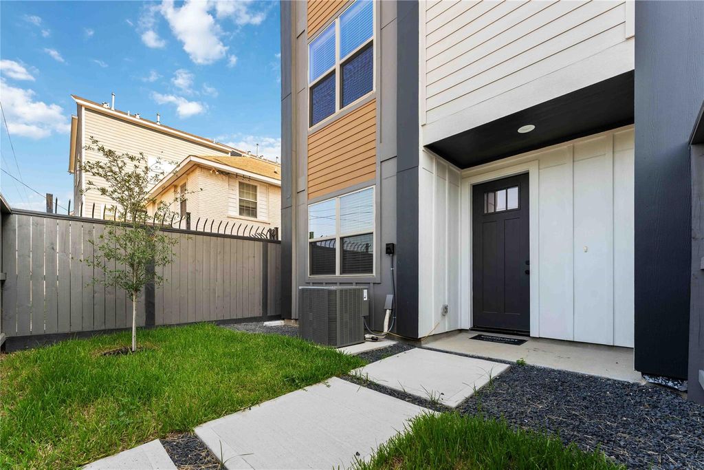 Front view of model unit. 2524 unit. All available homes have front green space