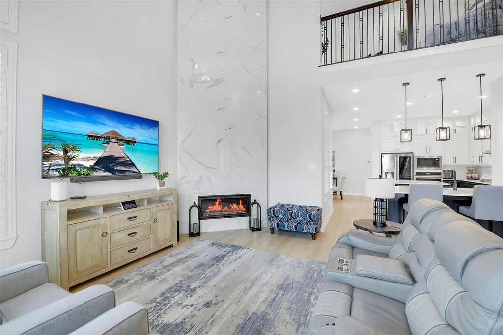 Floor to very high Ceiling Fireplace. This is another upgrade added during construction.