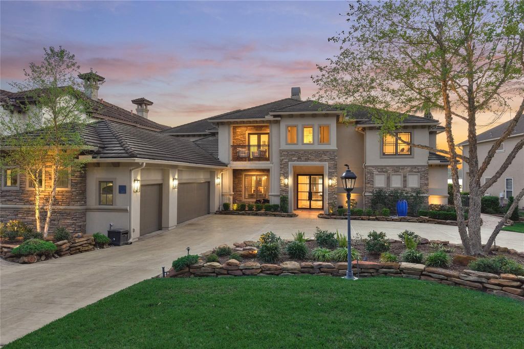 Embrace the beauty and quality of this completely updated lake front home that has a professionally landscaped exterior. 