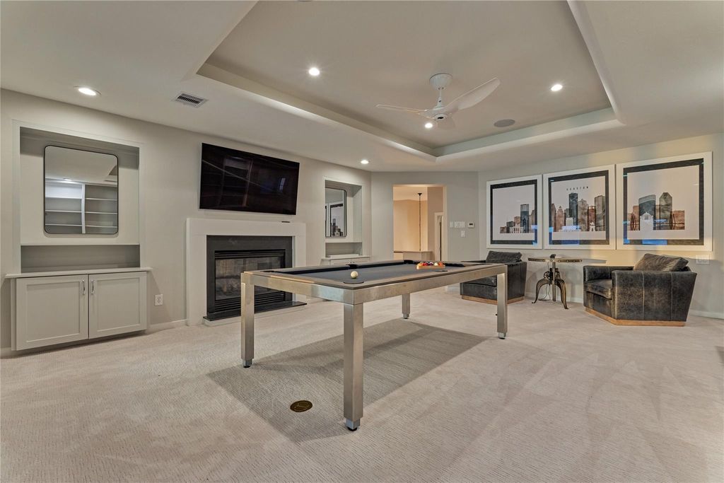 The game room provides extra space for entertaining. Whether its for adults or teenagers, this space provides options for everyone. 