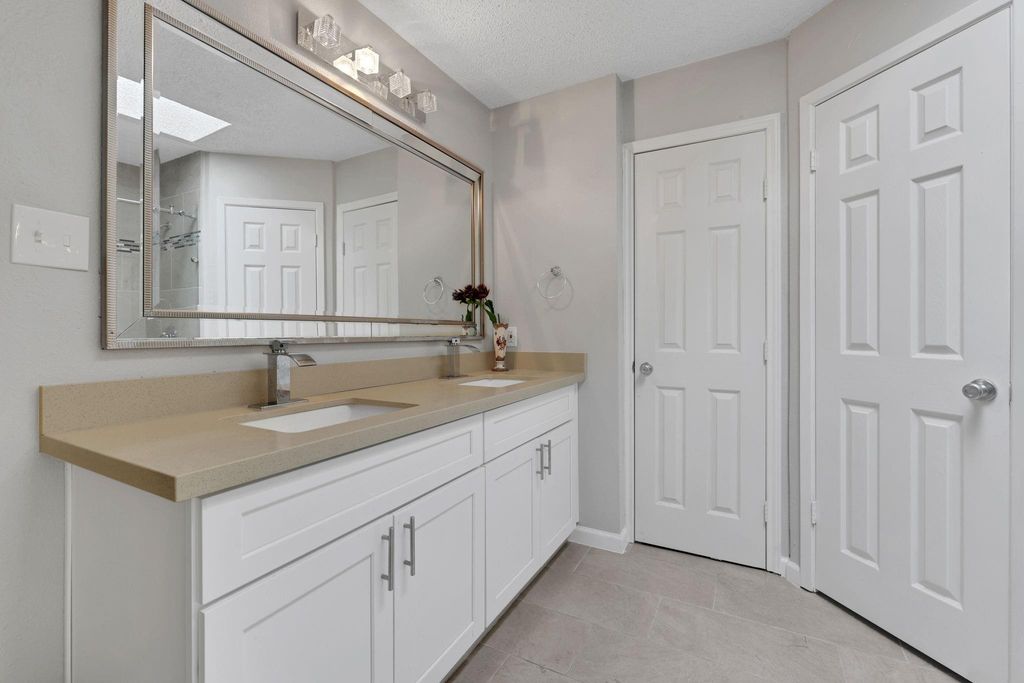 Primary en-suite with double sinks.