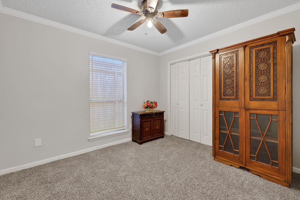 Secondary bedroom with barn door closest