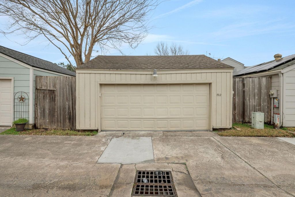 entrance to the garage is in the rear.  The home is fully fenced for safety